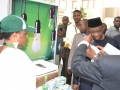 Exhibitors explains his products to Minister of Power Prof Nebo